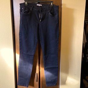 Black mid-rise skinny jeans